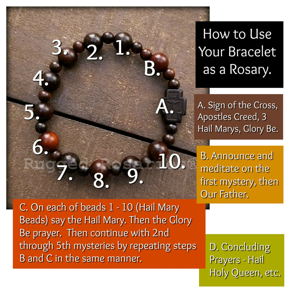 Elastic olive wood rosary bracelet with cross and silver bead  Canavati  Gallery